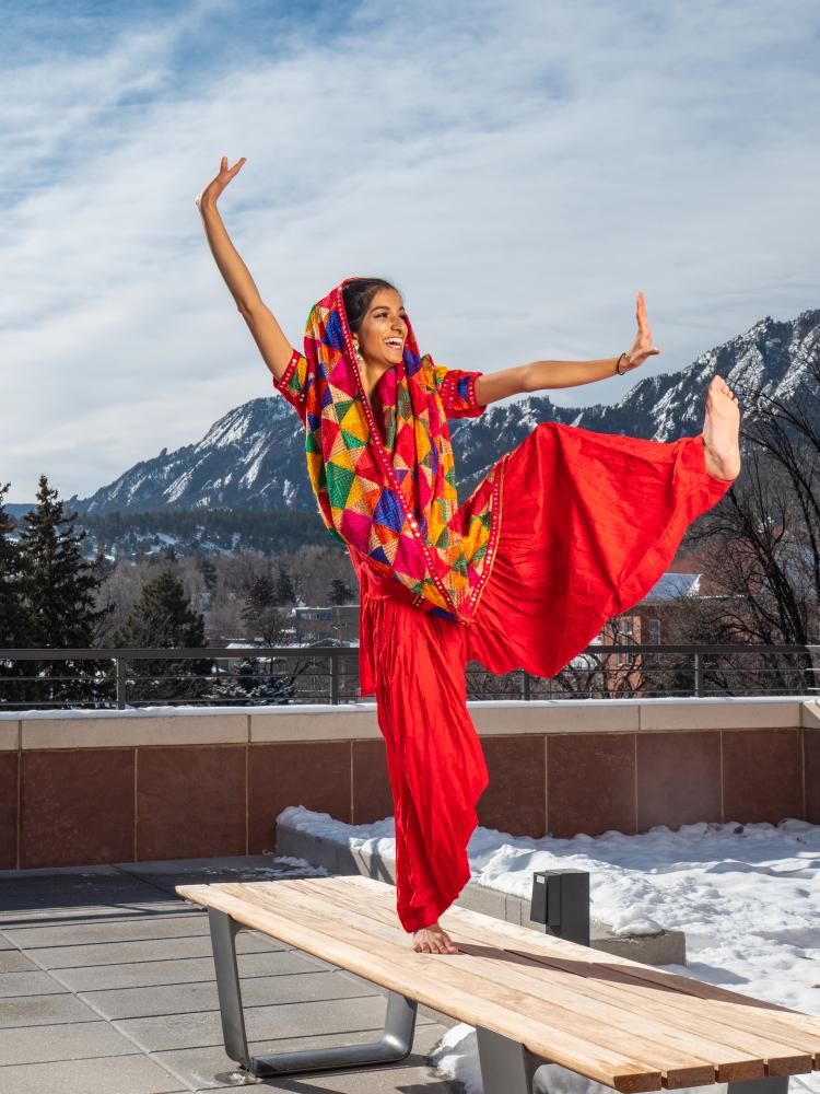 Serene Singh performs Bhangra dance on the deck of the CASE building