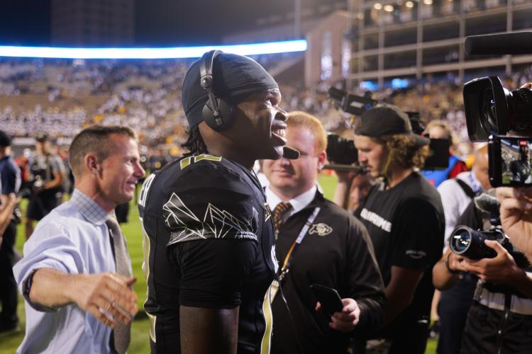Travis Hunter smiles before a TV appearance at the end of the first home CU Buffaloes football game of the season on Aug. 29, 2024, against the North Dakota State University Bison. (Photo by Glenn J. Asakawa/University of Colorado)