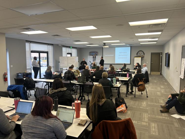 A group engages in multidisciplinary team training at the CUPD Training Center