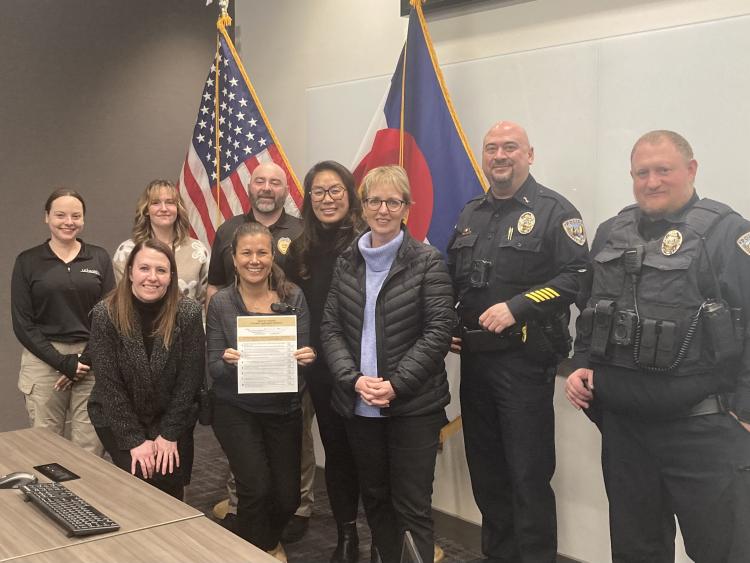 Sgt. Brian Brown, Deputy Chief Mark Heyart and Sarah Goodrum with co-responders from multiple police agencies in Colorado