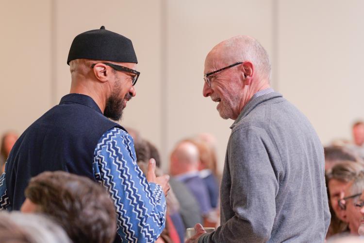 Provost Russell Moore chats with Professor Reiland Rabaka at the State of the Campus