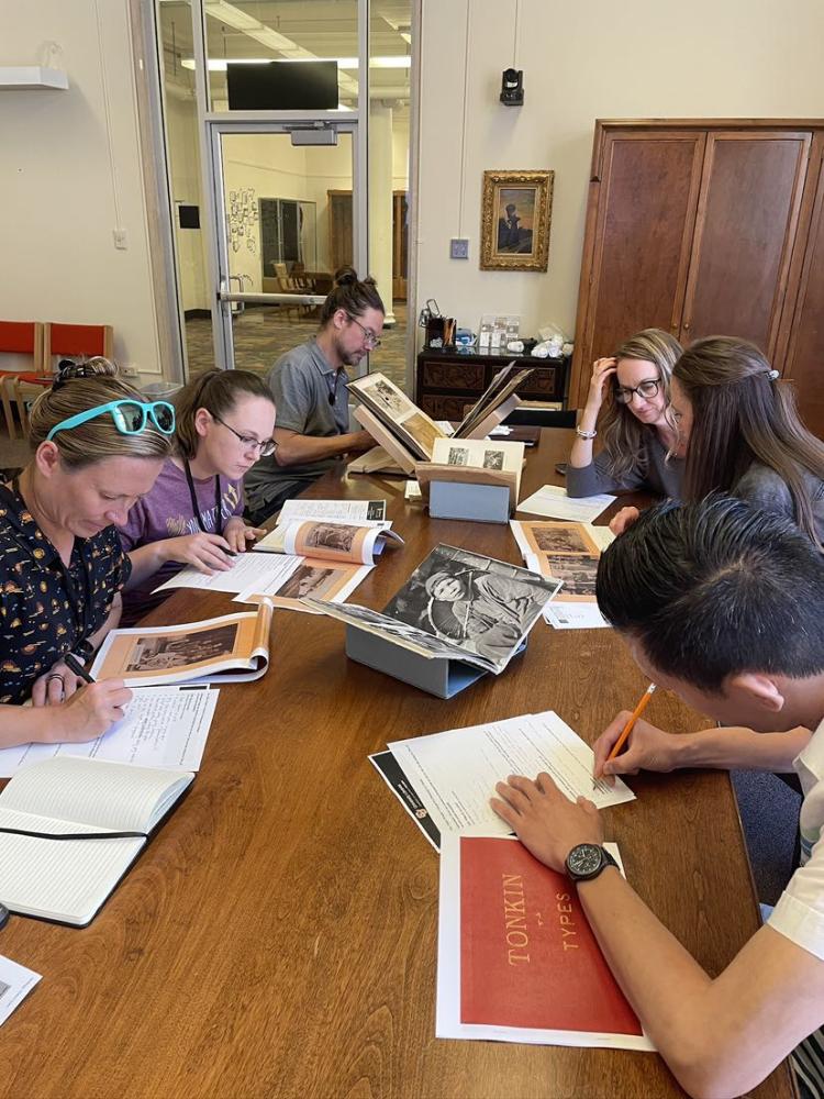 Educators discuss and analyze archival photos from University Libraries’ Rare and Distinctive Collections