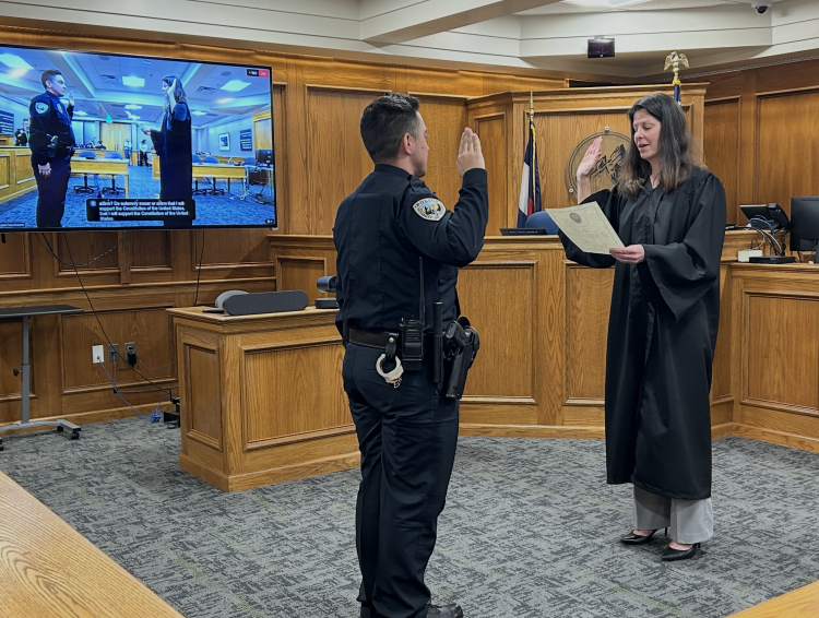 Officer Rickey Thomas swearing in