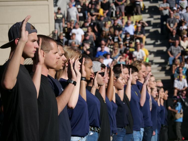 Fifty new recruits from the state of Colorado are sworn in to their respective military services during the first half of the Colorado-Stanford football game at Folsom Field on Saturday, Nov. 9, 2019. (Photo by Glenn Asakawa/University of Colorado)