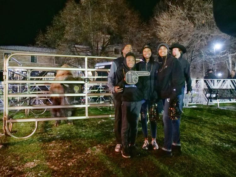 People take photos with the retiring Ralphie V ahead of Colorado's game against Washington on Saturday, Nov. 23, 2019. (Photo by Glenn Asakawa/University of Colorado)