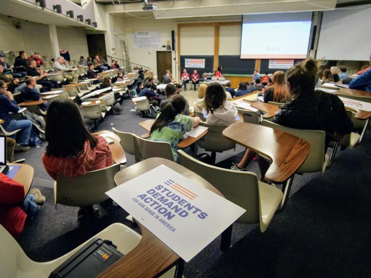 Students and panelists have a Q&A session at Students Demand Action meeting. Photo by Glenn Asakawa.