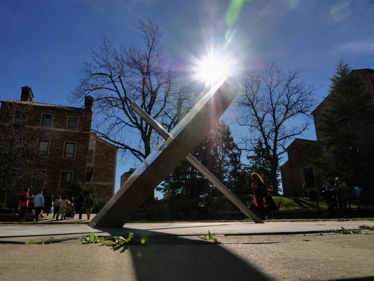 Sun shines over the sundial in the Norlin plaza. Photo by Glenn Asakawa.