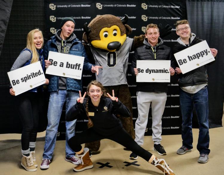Prospective students pose with Chip the Buffalo. Photo by Glenn Asakawa.