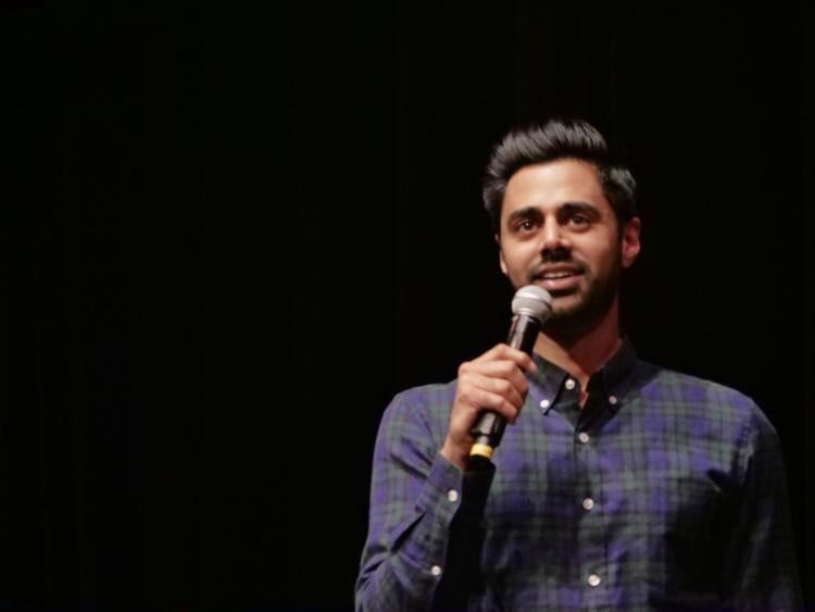 Hasan Minhaj speaks at Macky Auditorium. Photo by Glenn Asakawa.