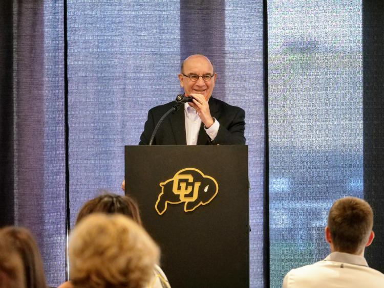 Chancellor DiStefano addresses Athletics staff at the Touchdown Club