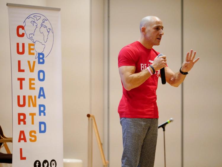 Suicide survivor and prevention advocate Kevin Hines speaks on campus. Photo by Glenn Asakawa.