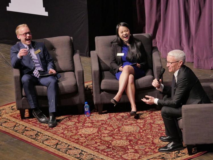 Moderators ask Cooper questions from attendees. Photo by Glenn Asakawa.