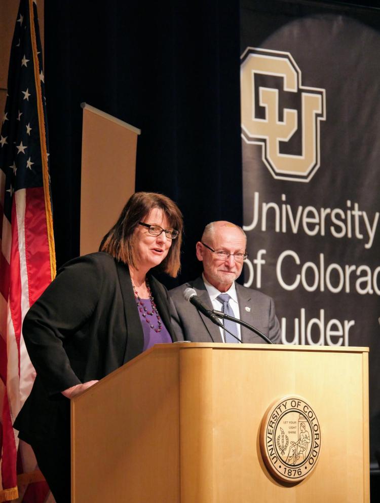 SVC and CFO Kelly Fox and Provost Russ Moore speak at the town hall.