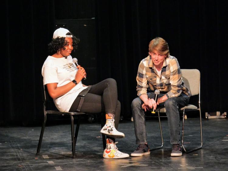 CU Boulder students Bri Hill, left, and Jackson Reinagel have a dialogue during the event. Photo by Glenn Asakawa.