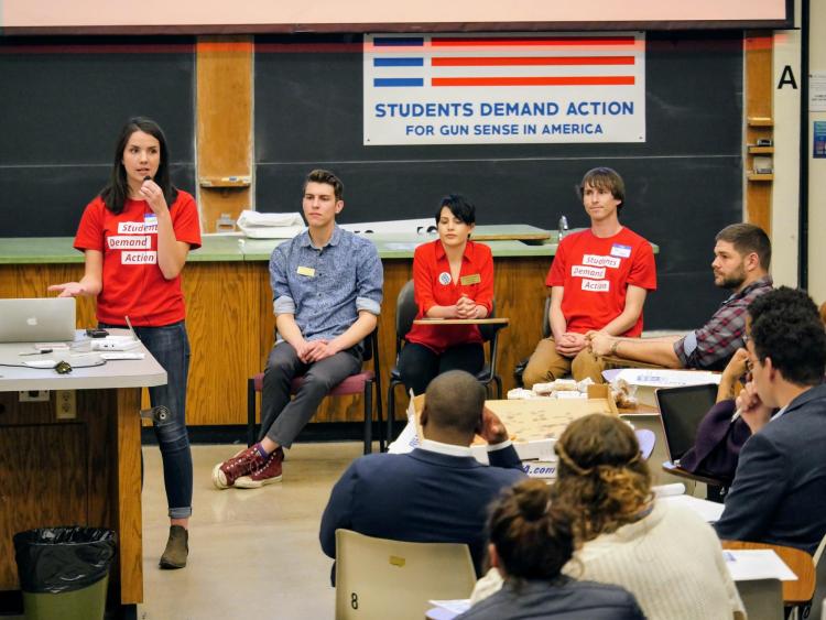 Students and panelists have a Q&A session at Students Demand Action meeting. Photo by Glenn Asakawa.