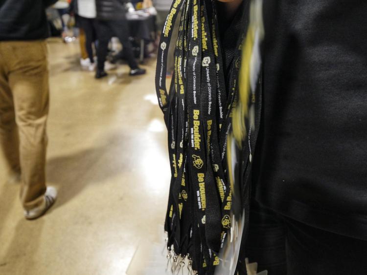 Buff lanyards were handed out to all admitted students. Photo by Glenn Asakawa.
