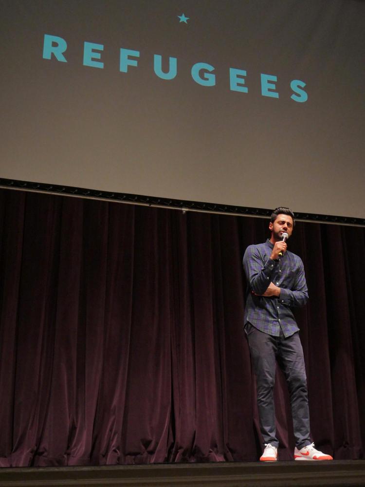Hasan Minhaj speaks at Macky Auditorium. Photo by Glenn Asakawa.