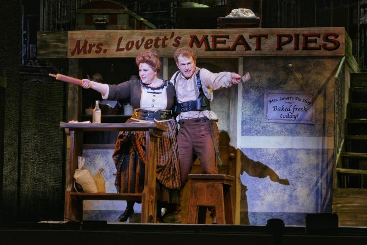 Cast members perform in the dress rehearsal of Sweeney Todd. Photo by Glenn Asakawa.
