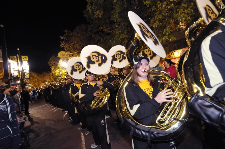 The CU marching band plays at the Homecoming parade