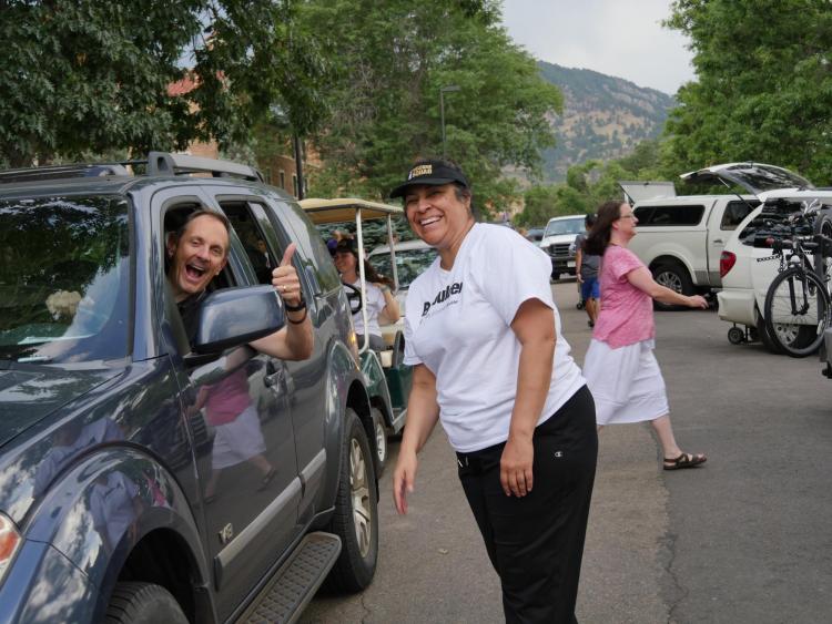 Christina Gonzales, vice chancellor for Student Affairs, directs traffic during move-in 2016.