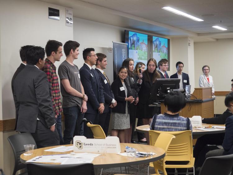 Students present at the Leeds Center Showcase. Photo by Glenn Asakawa.