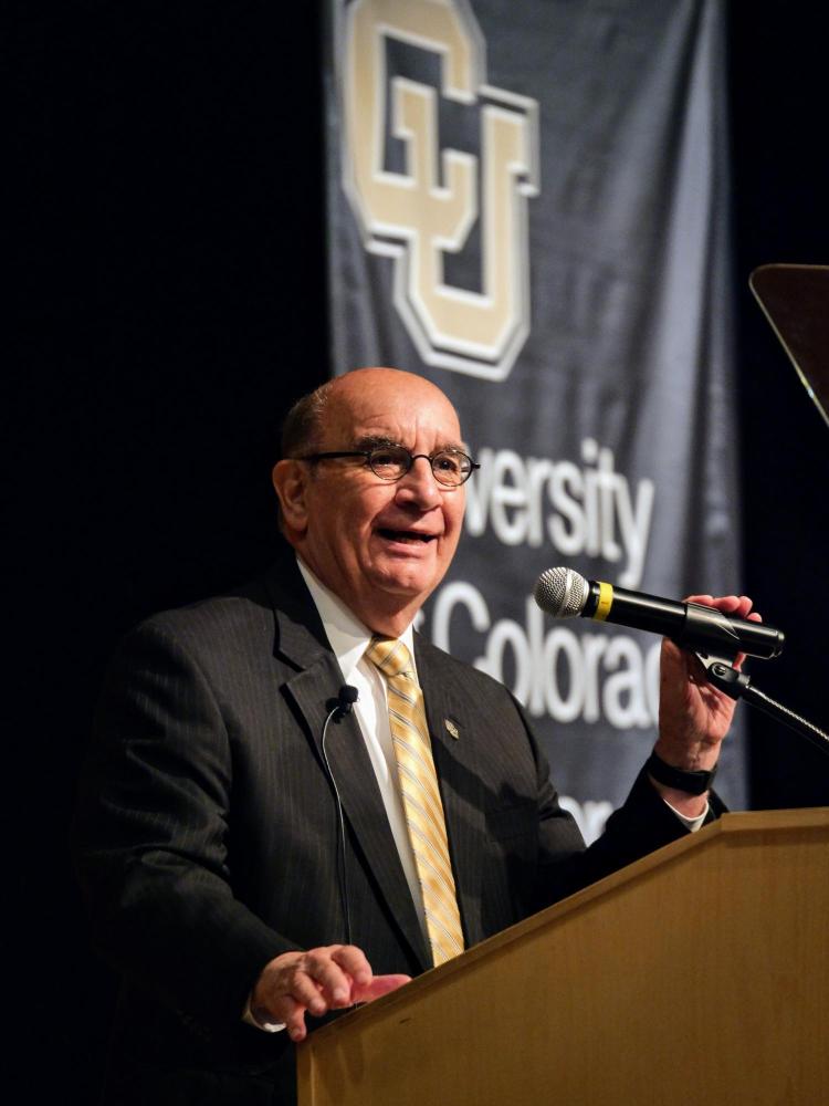 Chancellor Philip DiStefano speaks at podium