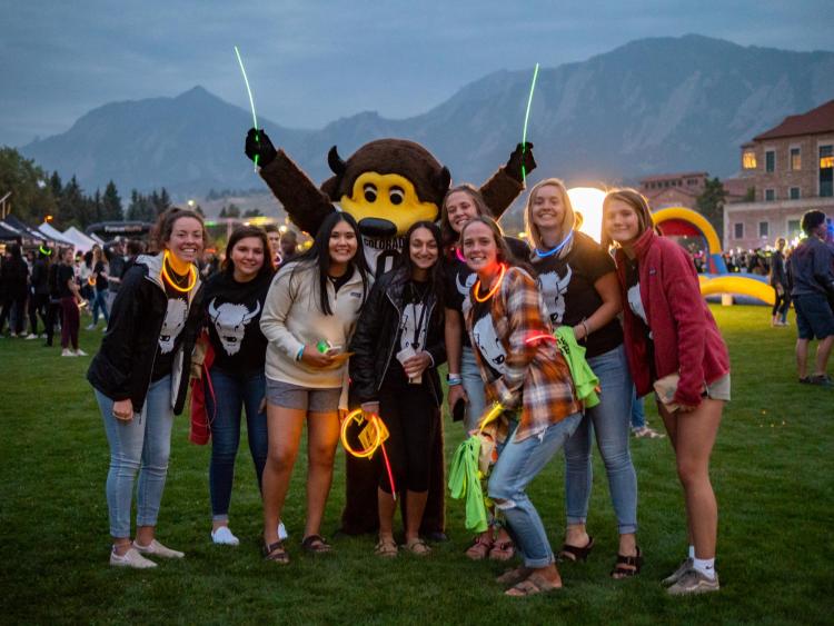 Chip and friends pose for a photo at Black & Gold Bash.