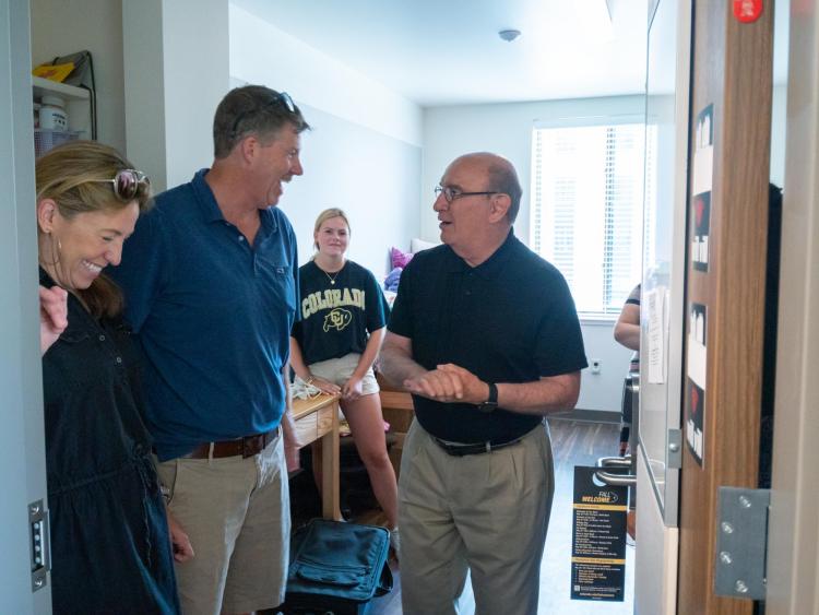 Chancellor Phil DiStefano meets with parents and students during move-in on Wednesday, Aug. 21, 2019, at Williams Village East. (Photo by Glenn Asakawa/University of Colorado)
