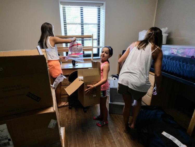 Scenes from move-in on Tuesday, Aug. 20, 2019, at Baker Hall. (Photo by Glenn Asakawa/University of Colorado)