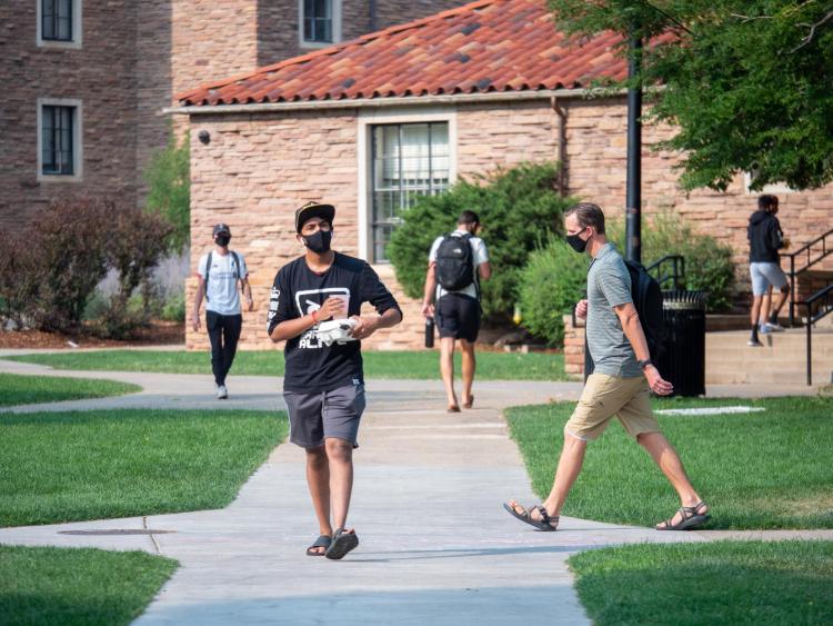 students walking on campus