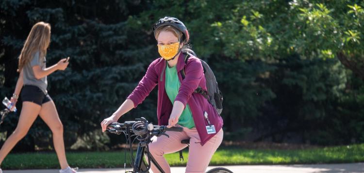 riding bike on campus