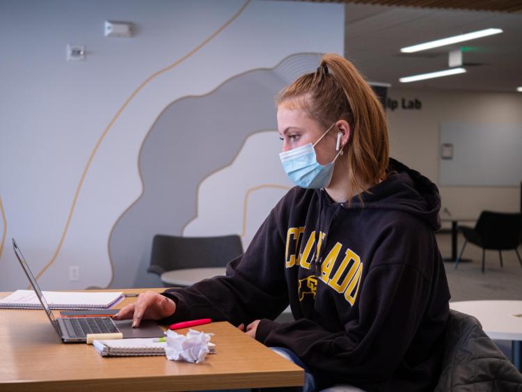 student studying inside