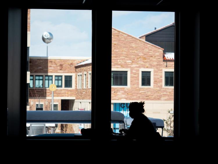 student studying inside