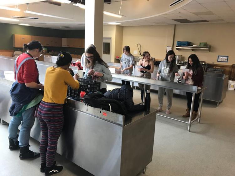 Chicago | Students organize supplies while learning about food access.