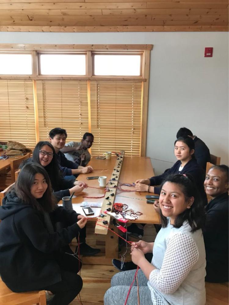 Minnesota | Making friendship bracelets at Camp One Heartland for kid campers facing social isolation, intolerance or serious health challenges.