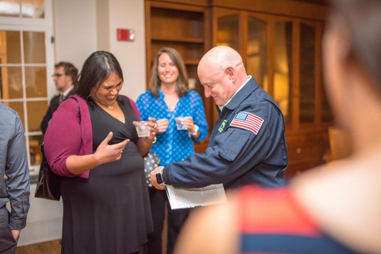 Scott Kelly gives an autograph at the reception; photo by Patrick Wine
