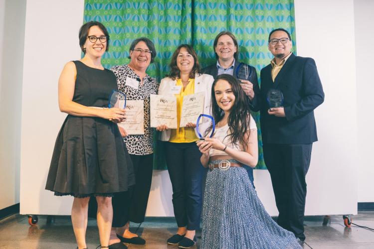Members from CU Boulder's Department of Strategic Relations and Communications holding awards at the 2023 PRSA Gold Pick Award ceremony.