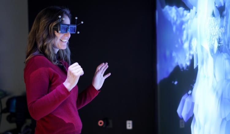 Scripps fellow wearing augmented reality goggles