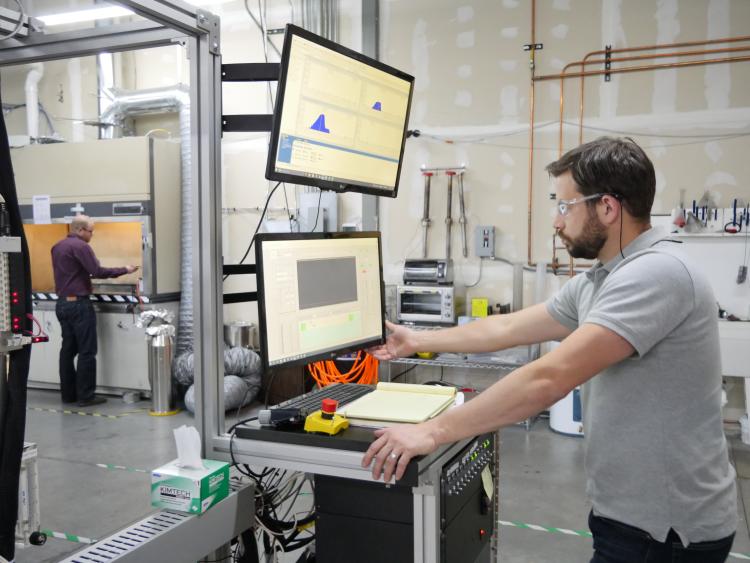Two CU Boulder alumni work in the ALD Nanosolutions lab