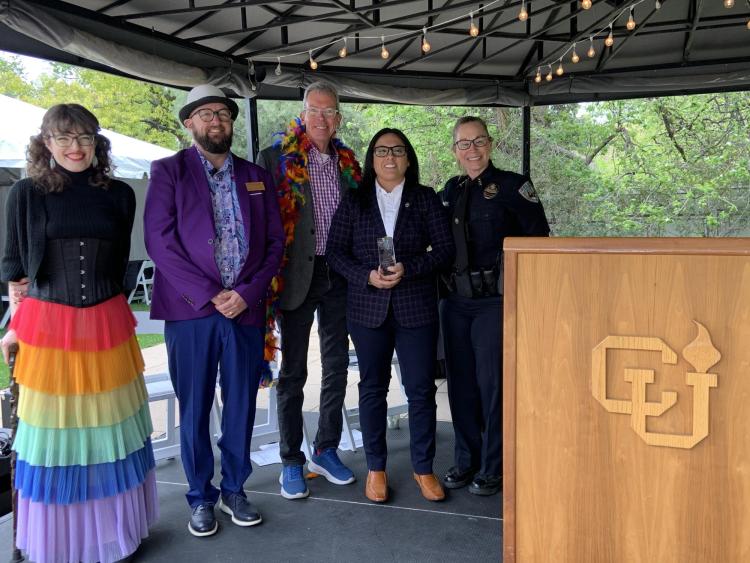 CUPD's Amber Snell receiving an award at Lavender Graduation