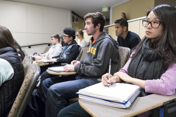 Students listen to lecture in classroom