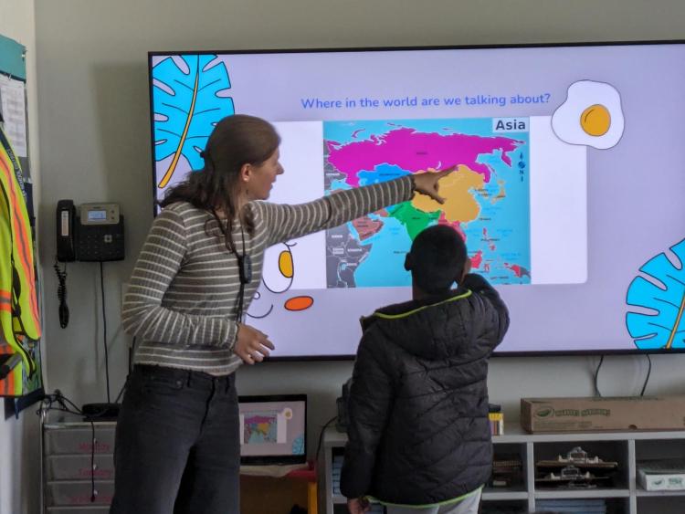 Ashley Launer engages with a fourth grader