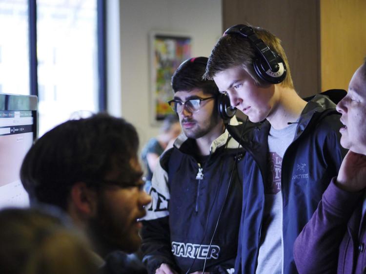 Visitors check out more than 100 student projects on display at the ATLAS expo. Photo by Patrick Campbell.