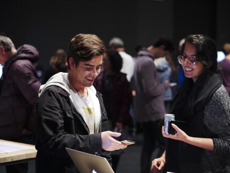 Visitors check out more than 100 student projects on display at the ATLAS expo. Photo by Patrick Campbell.