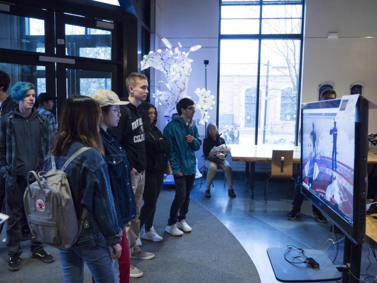 Visitors check out more than 100 student projects on display at the ATLAS expo. Photo by Patrick Campbell.