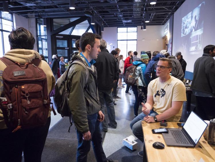 Visitors check out more than 100 student projects on display at the ATLAS expo. Photo by Patrick Campbell.