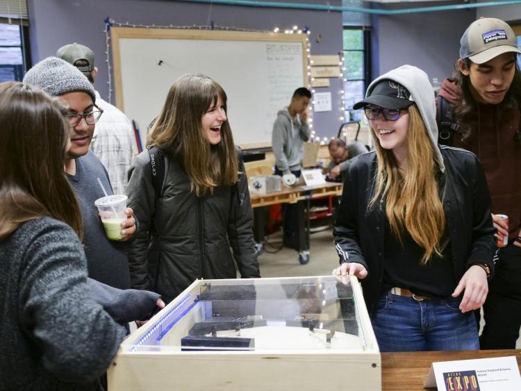 Visitors check out more than 100 student projects on display at the ATLAS expo. Photo by Patrick Campbell.