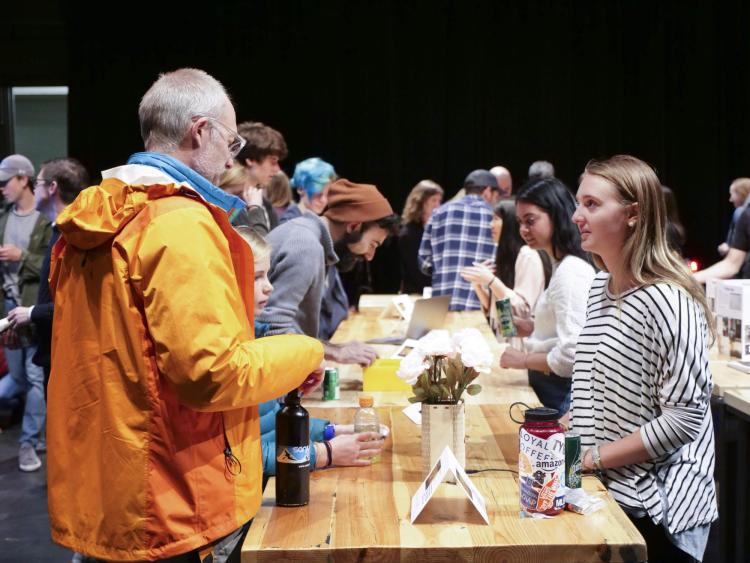Visitors check out more than 100 student projects on display at the ATLAS expo. Photo by Patrick Campbell.