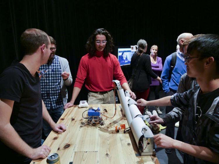 Visitors check out more than 100 student projects on display at the ATLAS expo. Photo by Patrick Campbell.