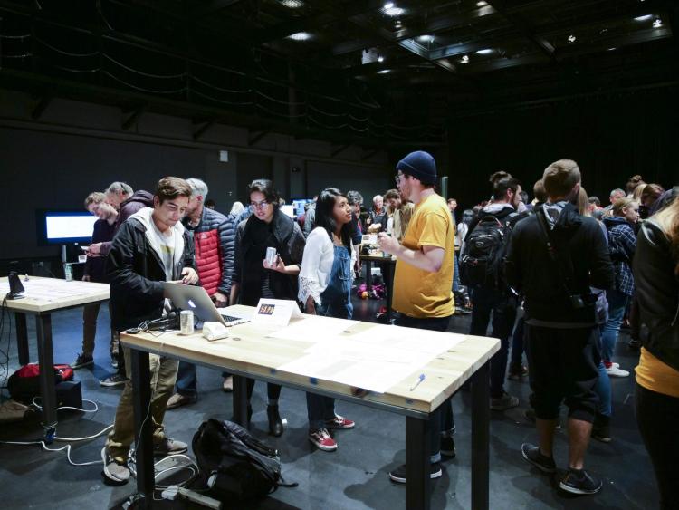 Visitors check out more than 100 student projects on display at the ATLAS expo. Photo by Patrick Campbell.